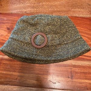 JLo tweed wool blend bucket hat with side buckle green brown